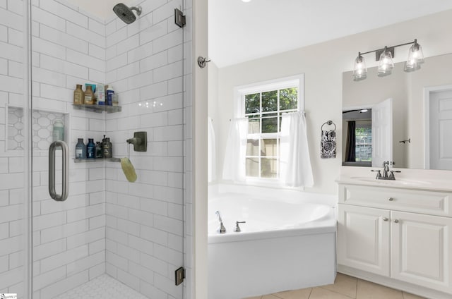 304 Camperdown Ct, Easley, SC 29642 - full bath featuring a shower stall, vanity, a garden tub, and tile patterned floors