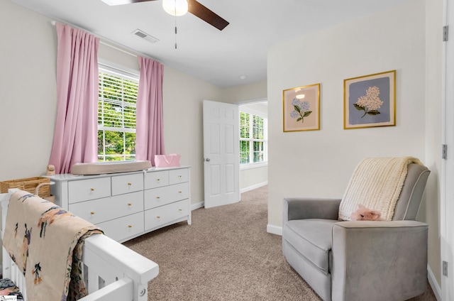 304 Camperdown Ct, Easley, SC 29642 - living area featuring a ceiling fan, healthy amount of natural light, and light colored carpet