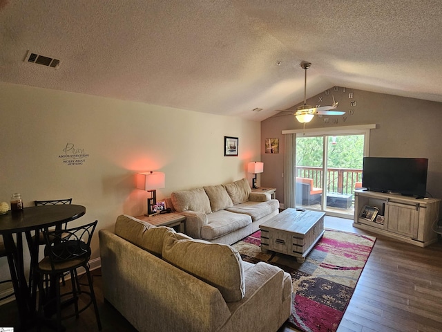 632 Lookover Dr, Anderson, SC 29621 - living room featuring wood finished floors, vaulted ceiling, ceiling fan, and a textured ceiling
