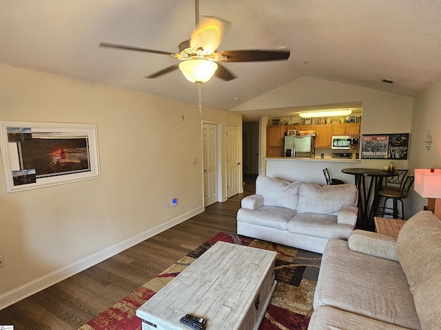 632 Lookover Dr, Anderson, SC 29621 - living area with dark wood-type flooring, vaulted ceiling, and a ceiling fan