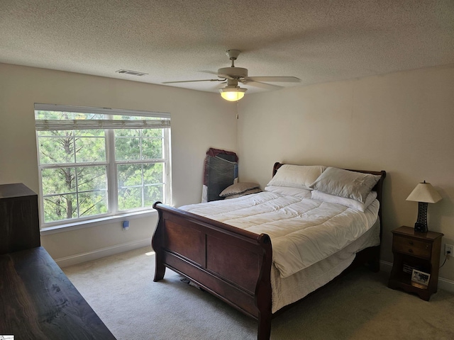 632 Lookover Dr, Anderson, SC 29621 - bedroom with light colored carpet, ceiling fan, and a textured ceiling