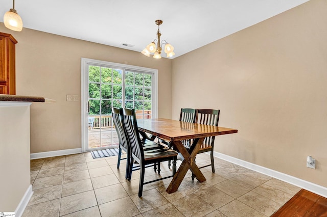 305 Cunningham Rd, Woodruff, SC 29388 - dining room featuring baseboards and a chandelier