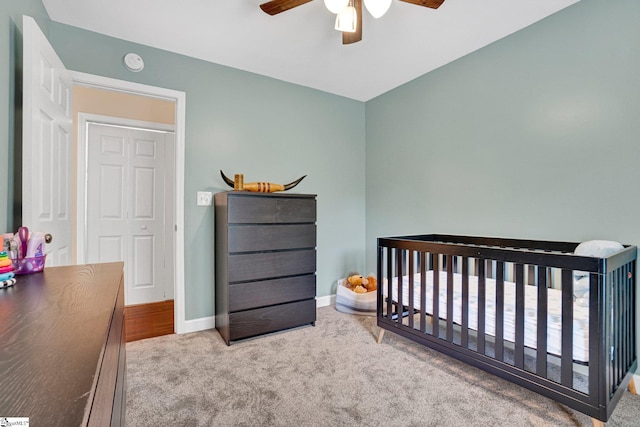 305 Cunningham Rd, Woodruff, SC 29388 - carpeted bedroom with a crib and a ceiling fan