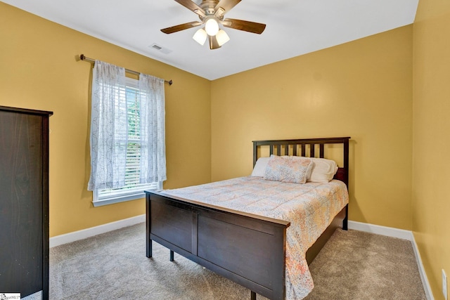 305 Cunningham Rd, Woodruff, SC 29388 - carpeted bedroom with multiple windows and a ceiling fan