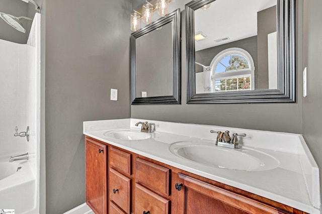 305 Cunningham Rd, Woodruff, SC 29388 - bathroom featuring double vanity and shower / bath combination