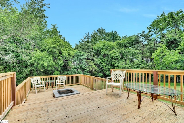 305 Cunningham Rd, Woodruff, SC 29388 - wooden deck with an outdoor fire pit