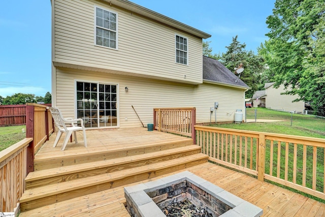 305 Cunningham Rd, Woodruff, SC 29388 - wooden terrace with a fenced backyard and a fire pit