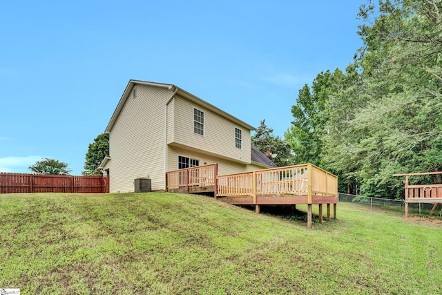 305 Cunningham Rd, Woodruff, SC 29388 - rear view of house with a fenced backyard and a wooden deck