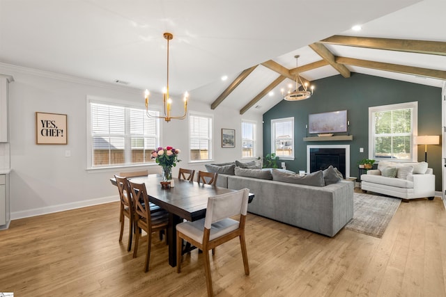 349 Encampment Blvd, Simpsonville, SC 29681 - dining room with a chandelier, light wood finished floors, healthy amount of natural light, a fireplace, and recessed lighting