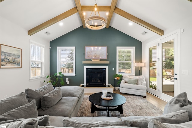 349 Encampment Blvd, Simpsonville, SC 29681 - living room featuring wood finished floors, a chandelier, plenty of natural light, recessed lighting, and a glass covered fireplace