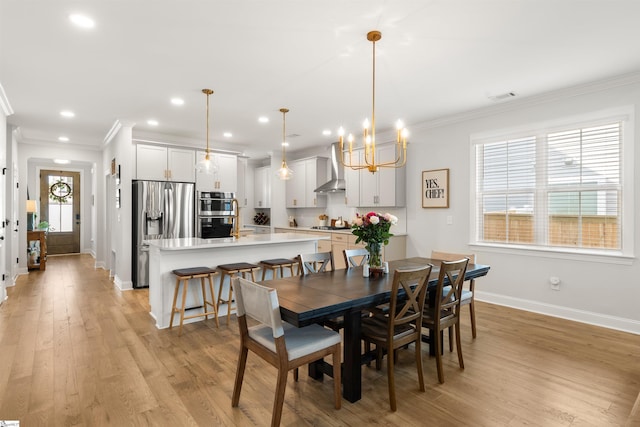 349 Encampment Blvd, Simpsonville, SC 29681 - dining space featuring crown molding, a chandelier, light wood-style floors, and recessed lighting