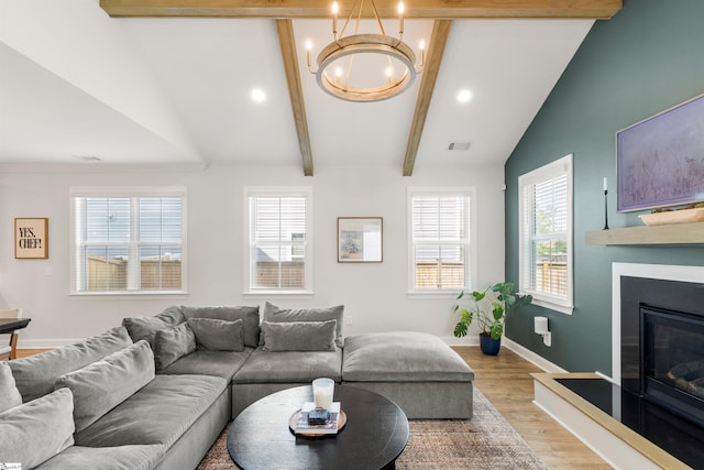 349 Encampment Blvd, Simpsonville, SC 29681 - living area with light wood-style floors, a chandelier, a glass covered fireplace, and recessed lighting