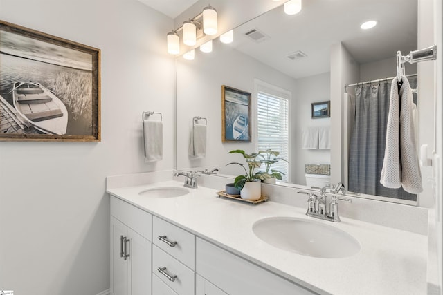 349 Encampment Blvd, Simpsonville, SC 29681 - bathroom featuring double vanity and curtained shower