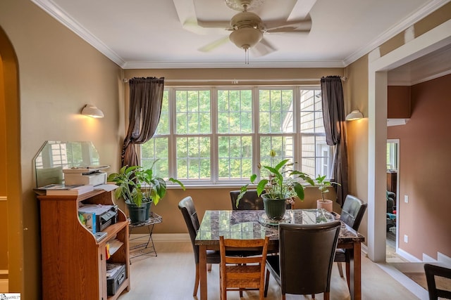 126 Midland Dr, Easley, SC 29640 - dining area with arched walkways, a ceiling fan, and crown molding