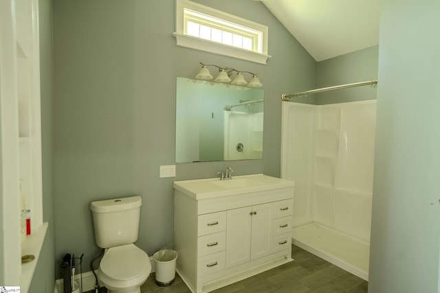 126 Midland Dr, Easley, SC 29640 - bathroom with vanity, vaulted ceiling, a shower, and wood finished floors