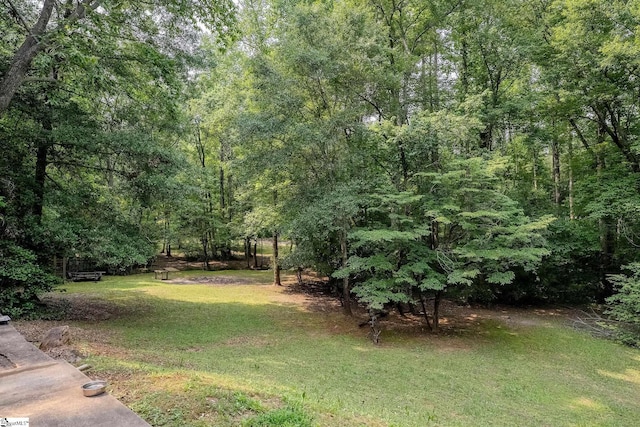 126 Midland Dr, Easley, SC 29640 - view of green lawn with a wooded view