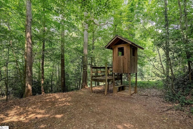 126 Midland Dr, Easley, SC 29640 - view of outbuilding featuring a view of trees