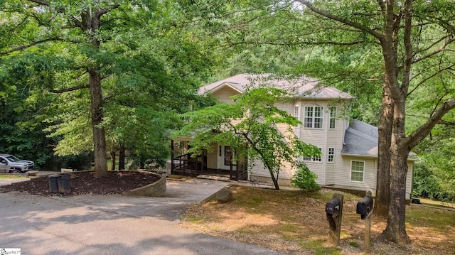 126 Midland Dr, Easley, SC 29640 - view of front facade featuring a shingled roof and asphalt driveway