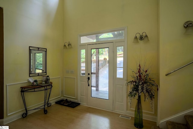126 Midland Dr, Easley, SC 29640 - entrance foyer featuring wood finished floors, stairway, and a high ceiling