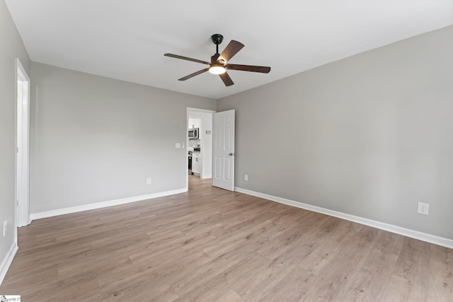 2005 Gap Creek Rd, Greer, SC 29651 - unfurnished room with a ceiling fan and light wood finished floors