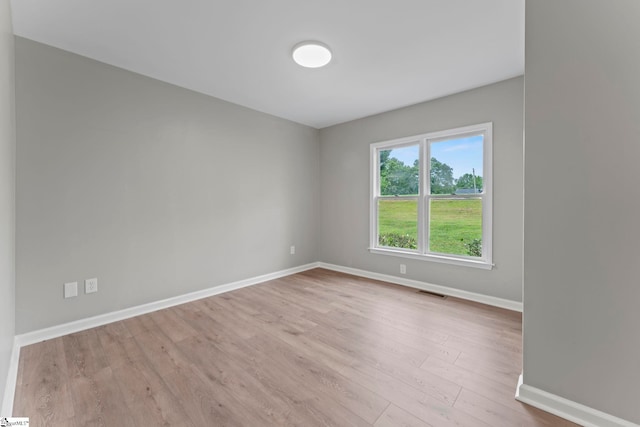 2005 Gap Creek Rd, Greer, SC 29651 - unfurnished room featuring baseboards and wood finished floors
