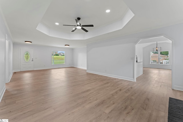 2005 Gap Creek Rd, Greer, SC 29651 - unfurnished living room featuring a raised ceiling, a ceiling fan, plenty of natural light, light wood finished floors, and recessed lighting