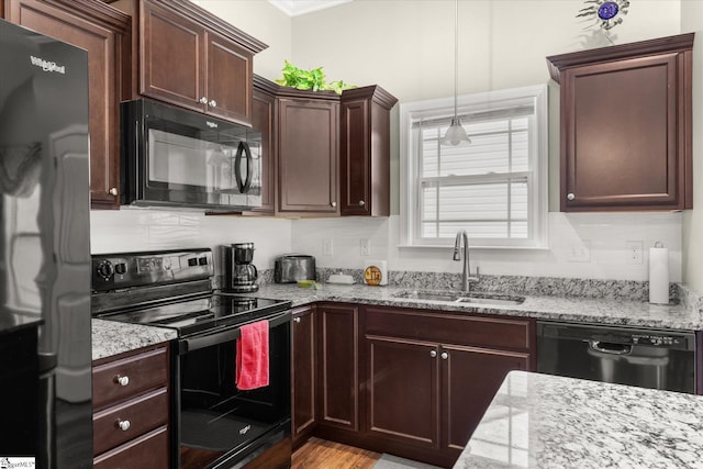 906 John Thomas Way, Greer, SC 29651 - kitchen featuring black appliances, ornamental molding, light stone countertops, and tasteful backsplash