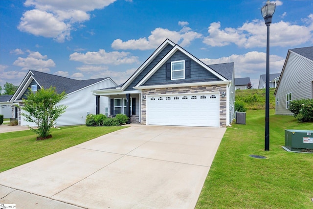 906 John Thomas Way, Greer, SC 29651 - view of front of house featuring stone siding, a front yard, and concrete driveway