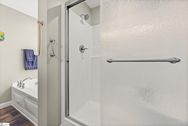 906 John Thomas Way, Greer, SC 29651 - bathroom with a stall shower, wood finished floors, and a garden tub