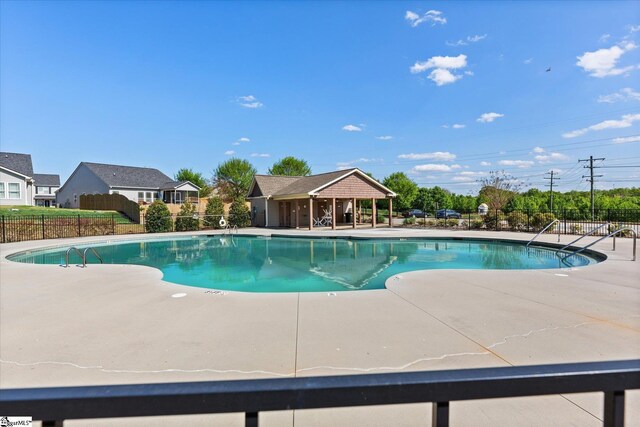 906 John Thomas Way, Greer, SC 29651 - community pool with a patio area