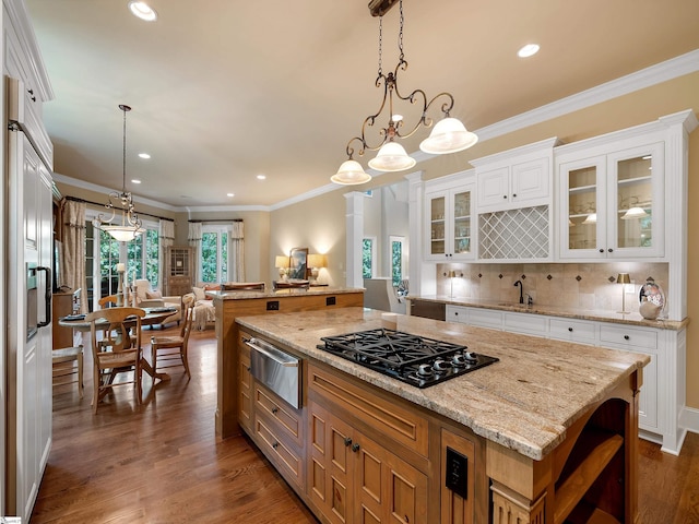 24 Lake Hills Ln, Travelers Rest, SC 29690 - kitchen featuring a warming drawer, black cooktop, ornamental molding, a center island, and recessed lighting