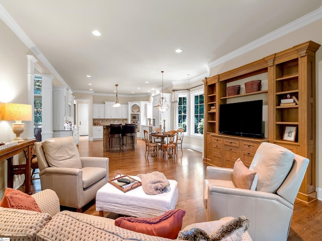 24 Lake Hills Ln, Travelers Rest, SC 29690 - living area featuring ornamental molding, light wood-style flooring, and recessed lighting