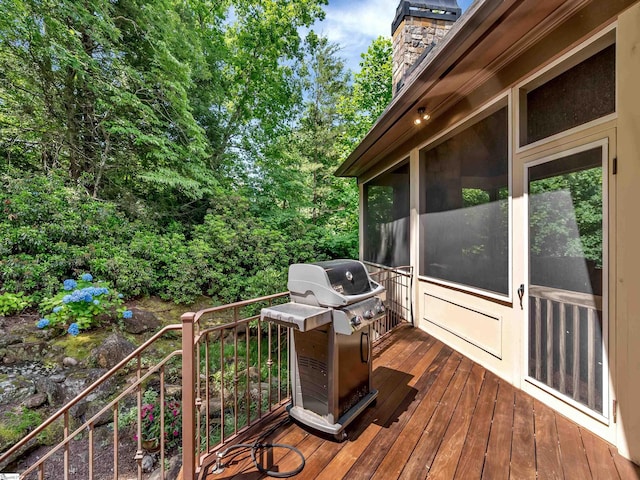 24 Lake Hills Ln, Travelers Rest, SC 29690 - wooden terrace featuring area for grilling and a sunroom