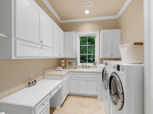 24 Lake Hills Ln, Travelers Rest, SC 29690 - laundry room featuring cabinet space, washer and clothes dryer, crown molding, and light tile patterned flooring