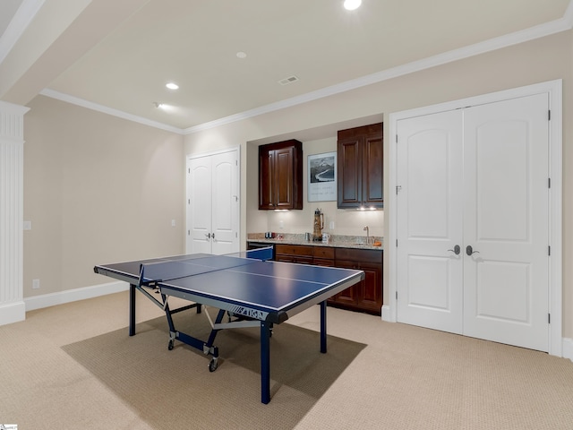 24 Lake Hills Ln, Travelers Rest, SC 29690 - playroom featuring light colored carpet, recessed lighting, ornamental molding, and bar with sink