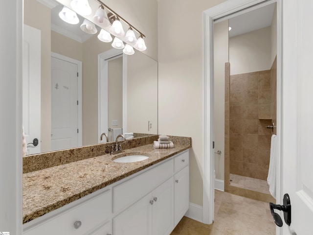 24 Lake Hills Ln, Travelers Rest, SC 29690 - bathroom featuring vanity, a tile shower, and tile patterned floors