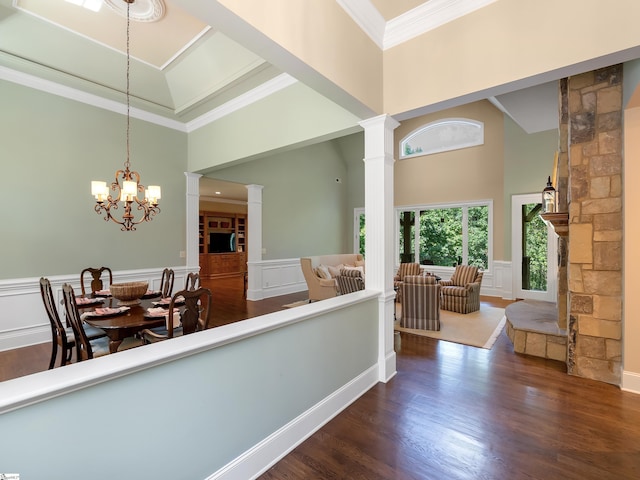 24 Lake Hills Ln, Travelers Rest, SC 29690 - corridor with decorative columns, a towering ceiling, a chandelier, dark wood finished floors, and ornamental molding