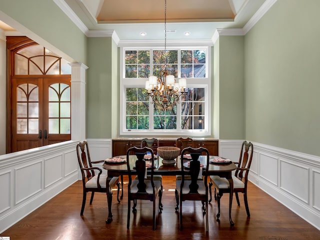 24 Lake Hills Ln, Travelers Rest, SC 29690 - dining space featuring plenty of natural light, a chandelier, crown molding, a decorative wall, and a wainscoted wall