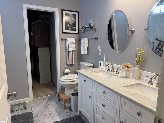 9 Kenton Finch Ct, Simpsonville, SC 29681 - full bath with double vanity, marble look tile flooring, and a walk in closet