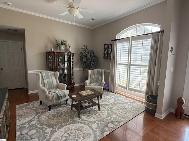 9 Kenton Finch Ct, Simpsonville, SC 29681 - living area with wood finished floors, a ceiling fan, and ornamental molding