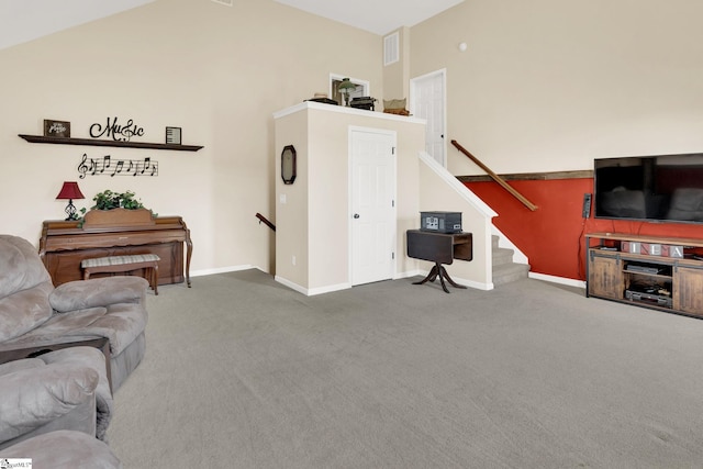112 Friesian Ct, Pelzer, SC 29669 - carpeted living area with stairway and vaulted ceiling