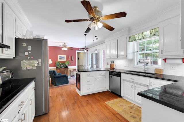14 Quail Meadow Ln, Greenville, SC 29617 - kitchen with dishwasher, a peninsula, white cabinetry, a ceiling fan, and decorative backsplash