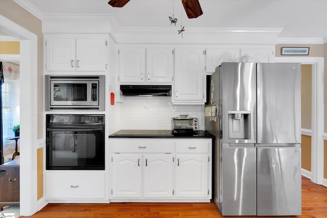 14 Quail Meadow Ln, Greenville, SC 29617 - kitchen with black appliances, under cabinet range hood, dark countertops, white cabinets, and decorative backsplash