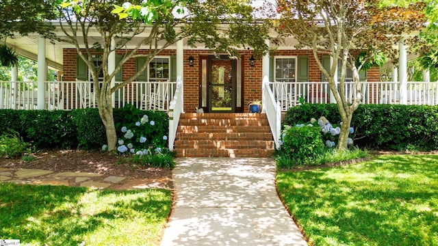 14 Quail Meadow Ln, Greenville, SC 29617 - view of front of house featuring a porch and brick siding