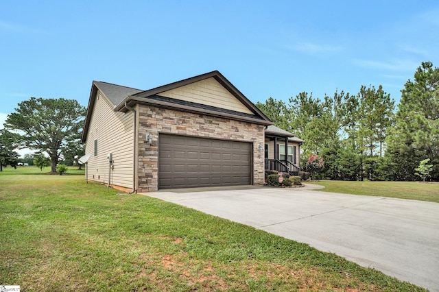 102 Tea Leaf Ct, Anderson, SC 29626 - view of front of home with a garage, stone siding, driveway, and a front yard