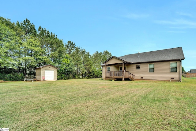 102 Tea Leaf Ct, Anderson, SC 29626 - back of house with crawl space, a garage, an outdoor structure, a wooden deck, and a lawn