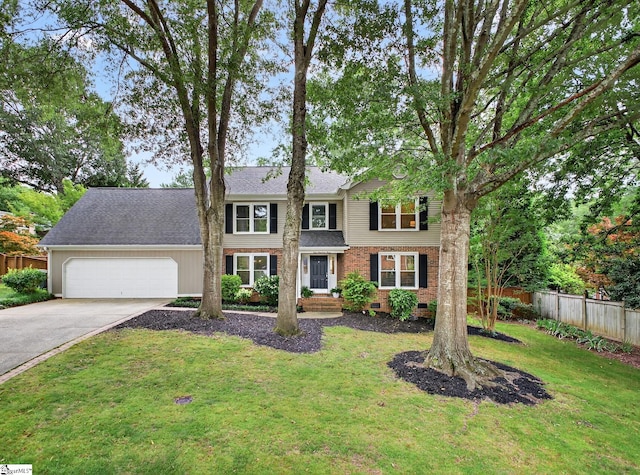 103 W Shallowstone Rd, Greer, SC 29650 - traditional home with a garage, concrete driveway, brick siding, and a shingled roof