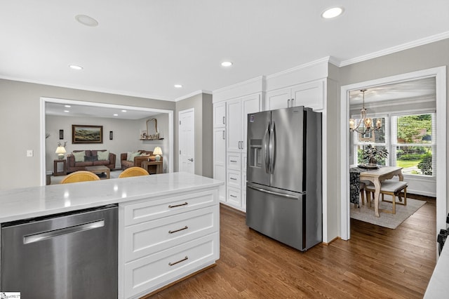 103 W Shallowstone Rd, Greer, SC 29650 - kitchen with stainless steel appliances, a chandelier, light stone counters, crown molding, and white cabinets
