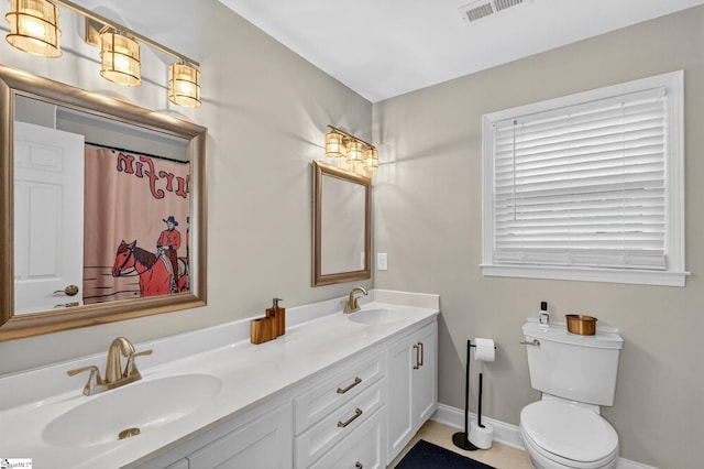 103 W Shallowstone Rd, Greer, SC 29650 - bathroom featuring double vanity and tile patterned flooring