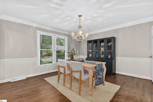 103 W Shallowstone Rd, Greer, SC 29650 - dining space with a chandelier, ornamental molding, and dark wood-style flooring